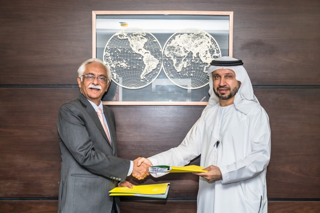 Rattan Keswani & Mohammed Abdulrazzaq Abdul Aziz Al Mutawa at the signing ceremony