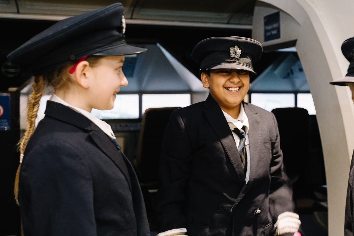 BA kids in pilot uniforms