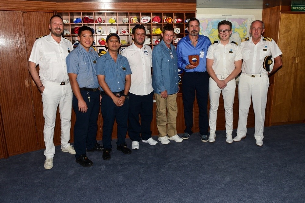 Rescued seafarers pictured on the bridge of Sea Princess