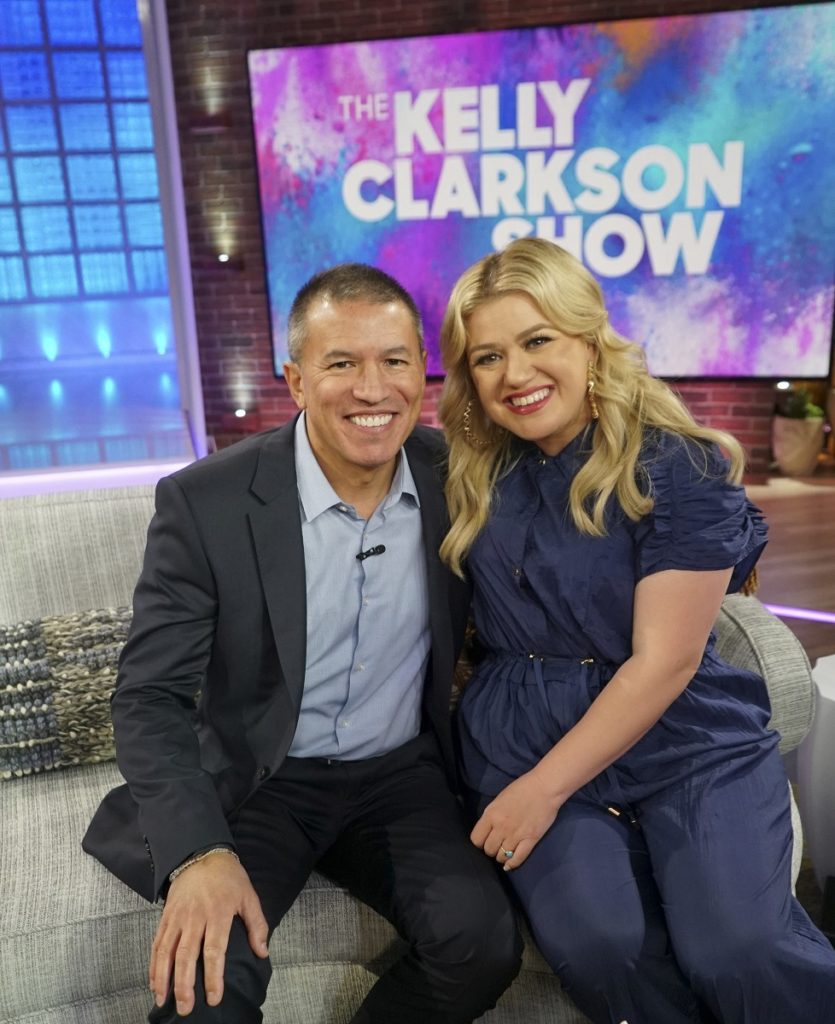 NCL president and CEO Andy Stuart with Kelly Clarkson