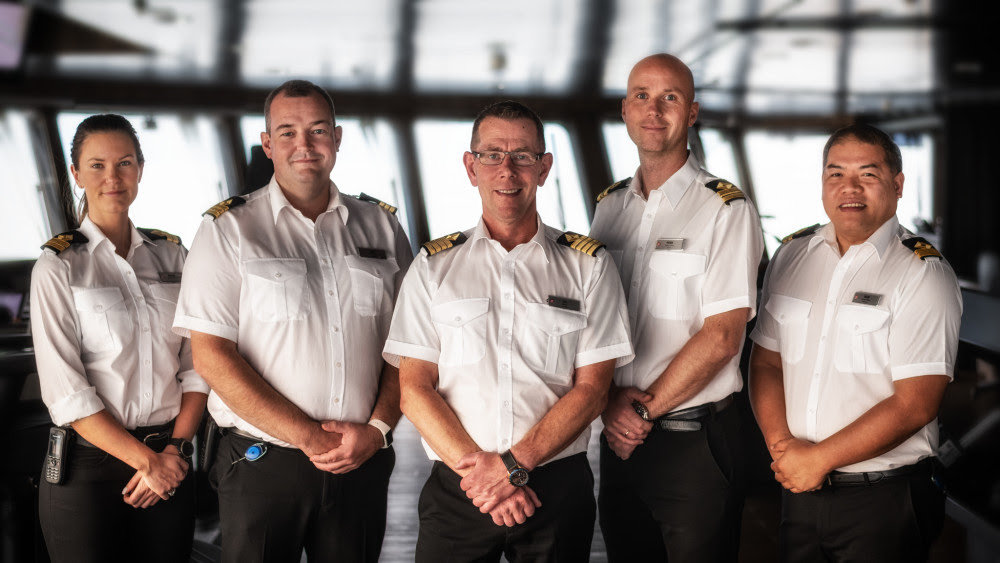 Captain Kai Albrigtsen (centre) and his crew